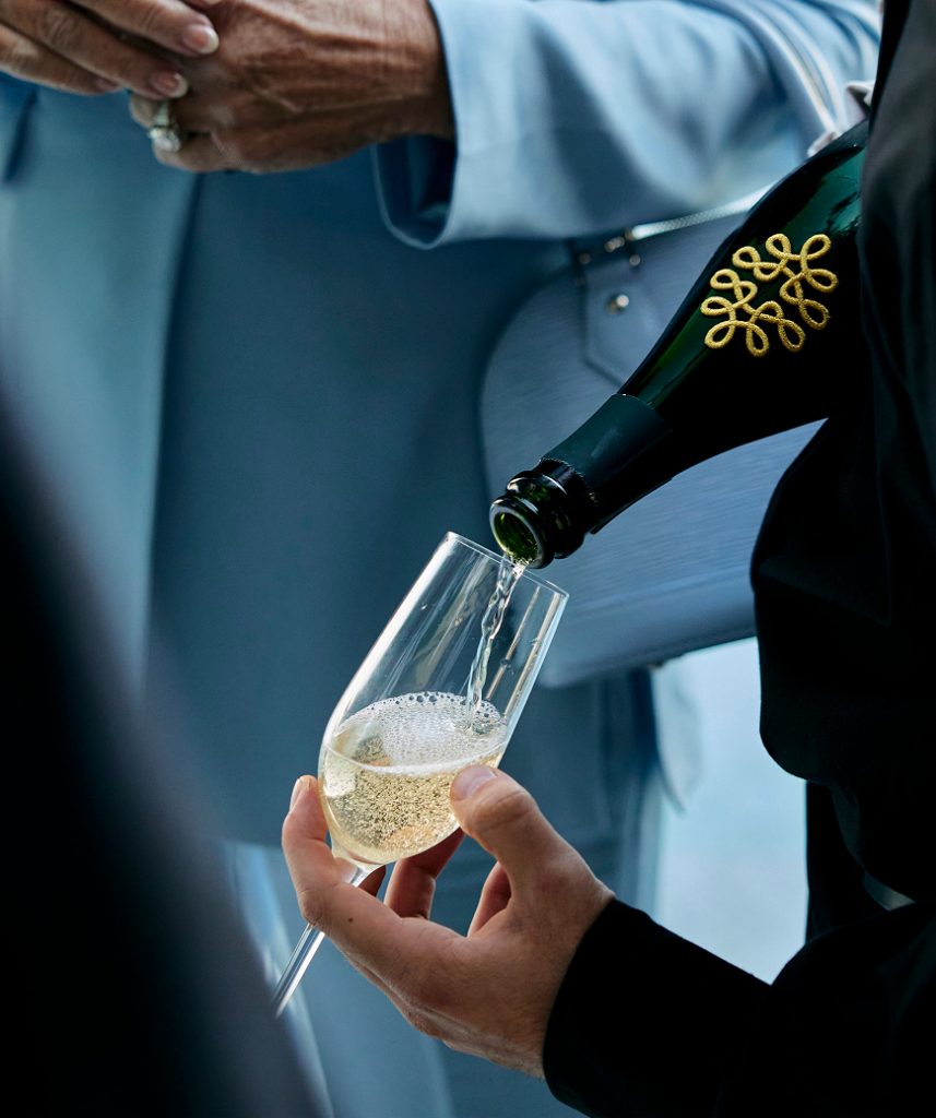 serving champagne
